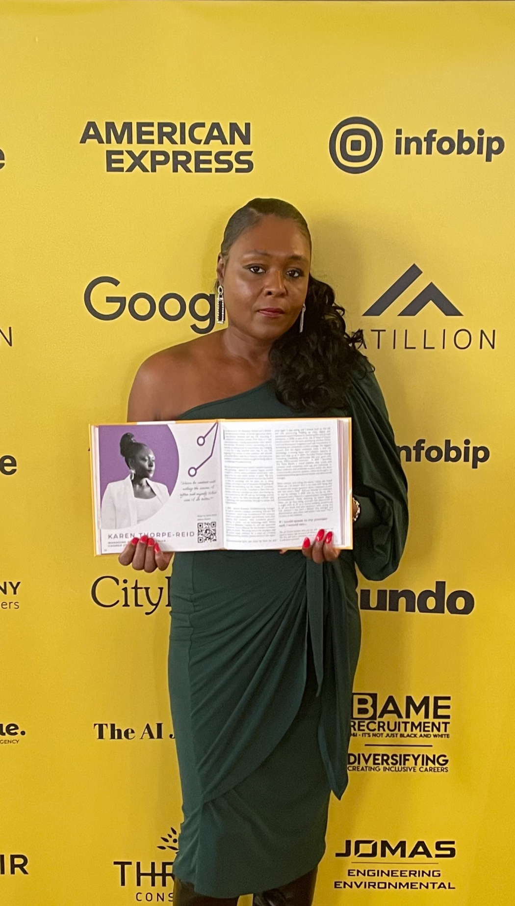Karen Thorpe-Reid pictured with The Voices in the Shadow, in which her story was selected for publication.